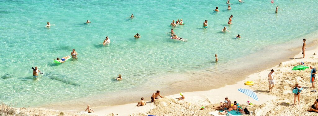 busy beach in spain